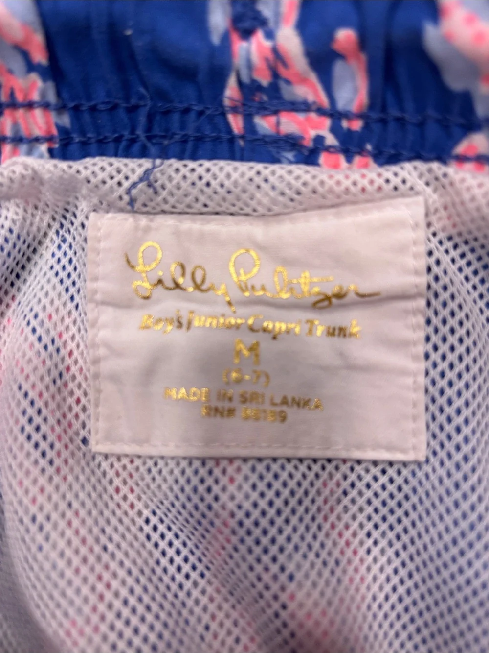 Lilly Pulitzer Blue Swim Trunks with Pink Coral Motif